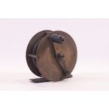 An early 20th century brass fishing reel