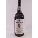 A bottle of Warre's vintage port,