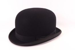A Lock & Co bowler hat,