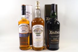 3 bottles of whisky comprising : 1 Bowmore Legend Islay (700ml, 40% proof,