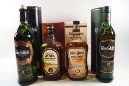 4 bottles of whisky comprising : 1 Jura 8 year old (750ml, 40% proof,