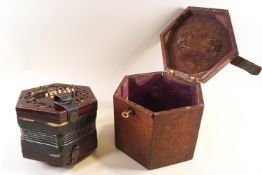 A 19th century rosewood concertina with forty-eight buttons, numbered 34040,