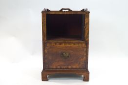 A George III mahogany veneered wash stand with strap frieze over a tambour fronted cupboard over a