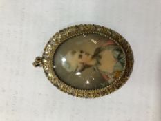 A gilt locket/brooch, stamped 800,