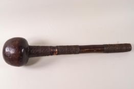 A hardwood South African knobkerry with wirework grips, 50.