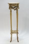 A 19th century French jardiniere stand with plaster moulded with flowers,