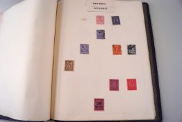 Four stamp albums containing All World stamps