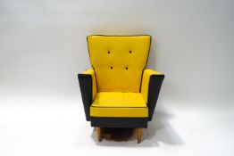 A 1950's/60's button back child's chair in yellow and black leatherette,