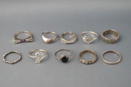 A collection of ten white metal dress rings, seven stamped "925",