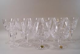A set of six Waterford crystal wine glasses, 15cm high, a pair of sherry glasses,