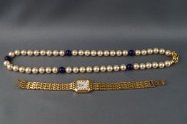 A ladies Rotary quartz gold plated bracelet watch with mother of pearl dial,