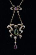 An early 20th century Suffragette necklace with sapphire, seed pearl and peridot. Stamped 15ct 6.