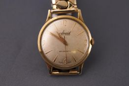 A 9ct gold cased Accurist watch, mechanical movement with gold plate expanding bracelet 43.