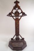 A late Victorian cast iron stick stand,