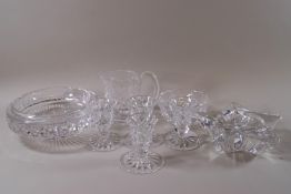 A collection of Waterford crystal: a set of four dwarf candlesticks, 8cm high,