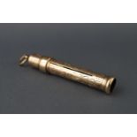 An Edwardian 9ct gold pencil holder, engraved with scrolling foliage, 5cm long, Birmingham 1904, 7.