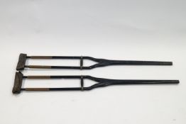A pair of late 19th/early 20th century ebonised crutches,