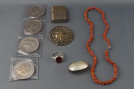 A selection of items to include a set of four commemorative Lady Diana coins, dated 1981,
