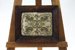 An 18th century silk and beaded altar cushion,