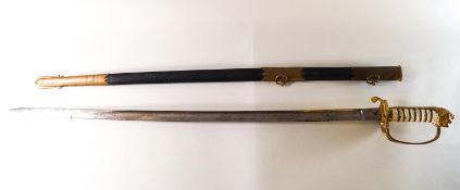 A Wilkinsons Naval dress sword and scabbard, the engraved blade with oakleaf detail,