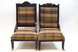 A pair of Victorian mahogany salon chairs with tartan upholstery