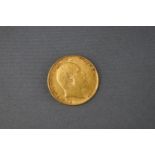 A 22ct yellow gold half sovereign coin, dated 1906 4.