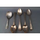 A set of three silver tea spoons with bright cut decoration,