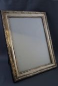 A modern silver photo frame, overall 30cm x 25cm,