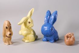 Four Sylvac figures, two in the form of rabbits, a dog and a bear,