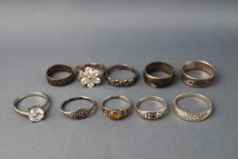A collection of ten white metal dress rings, seven stamped "925",