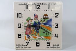 A square wall clock, the pottery face printed with 'Jack & Jill went up the hill', 21cm square,