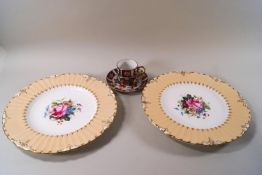 A pair of Royal Crown Derby painted plates,