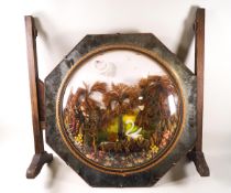 A Victorian and 1930's combined fire screen with domed glass panel enclosing a dried flower and