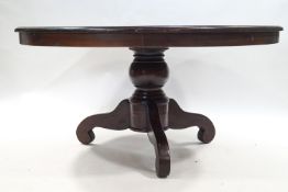 A large 20th century Dutch rosewood circular dining table,