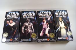 Four 1996 Kenner Star Wars collector series figures: Obi-wan Kenobi, Darth Vader, Han Solo,
