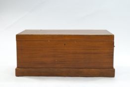 A Czech teak and plywood chest with two brass handles and an interior sliding tray,
