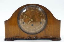 A Smiths walnut mantel clock with chiming movement, complete with key and pendulum,