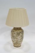 A Japanese earthenware vase mounted as table lamp with shade,
