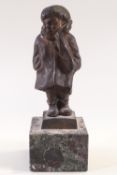 An Italian bronzed figure of a child in winter attire, signed Passaglia, on a square marble base,