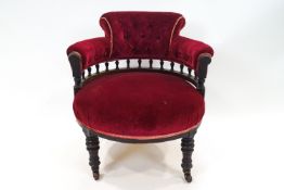 A Victorian mahogany nursing chair of tub form,