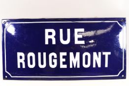 A French enamel road sign 'Rue Rougemont',