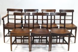 A set of seven 19th century mahogany bar back dining chairs with curved seats on square legs joined