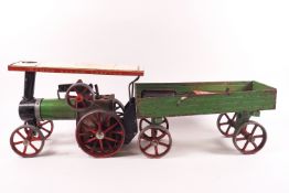 A Mamod tin plate traction steam engine and cart, with original paper leaflet,