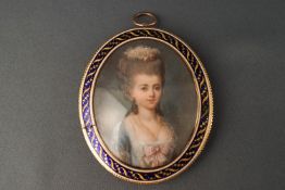 An 18th century portrait of a lady in a blue dress, watercolour on ivory,