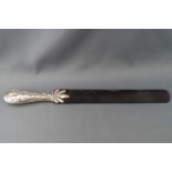 A Victorian tortoiseshell silver mounted page turner, overall 38cm long,