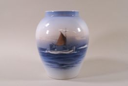A Royal Copenhagen baluster vase, decorated with a scene of sailing boats upon the sea,