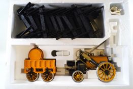 A 3 1/2 gauge live steam railway set of 'Rocket' by Hornby, boxed and never used,