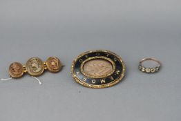 A Mourning brooch, a paste stone ring and a lava cameo brooch 22.