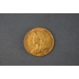 A 22ct yellow gold full sovereign coin, dated 1899 8.