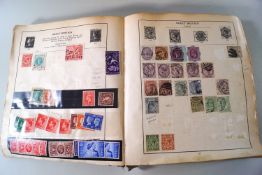 An old, well filled green Stamp album